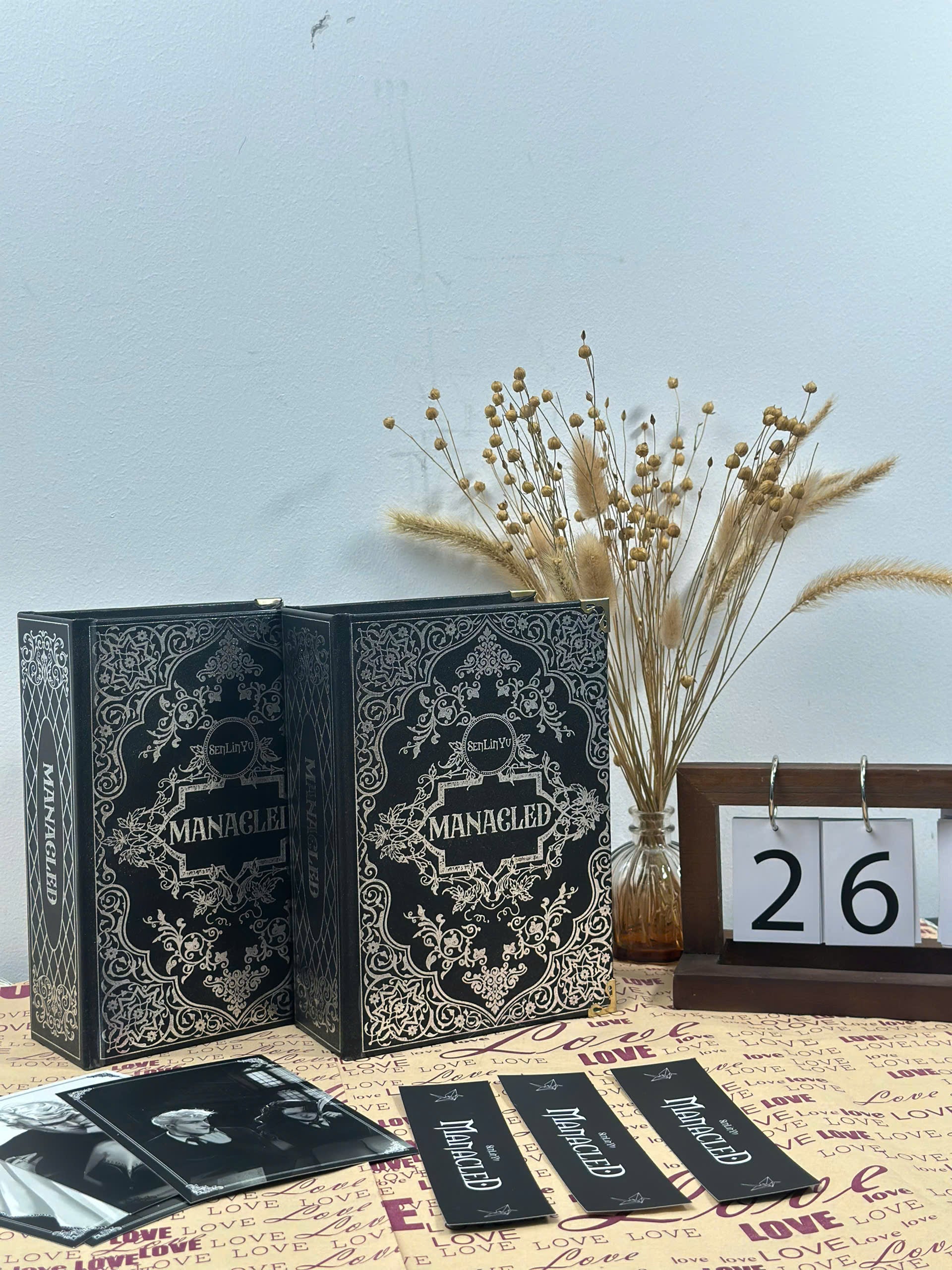 Manacled Collector’s Edition | Silver Foil Hardcover & Hand-Painted Edges