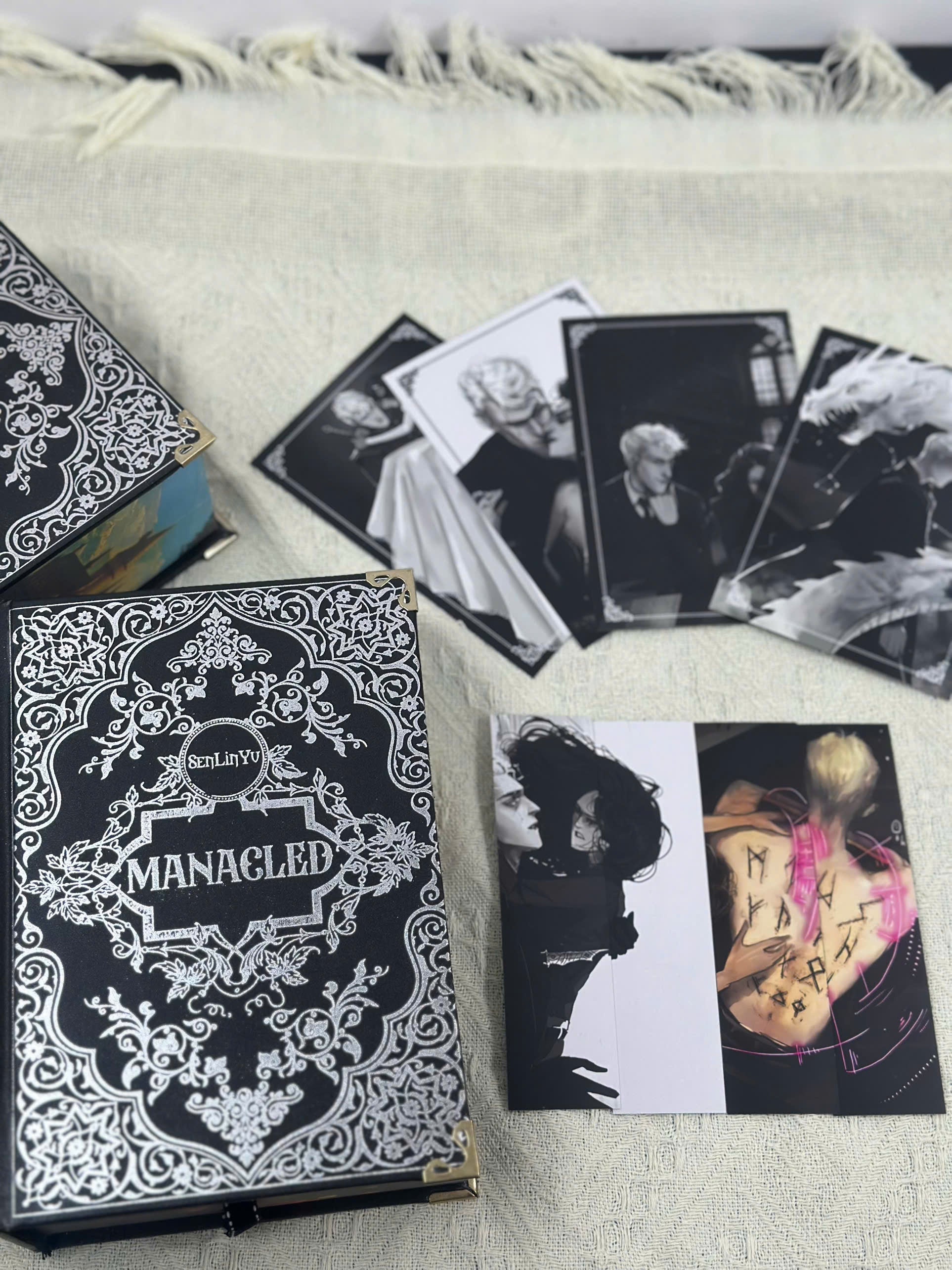 Manacled Collector’s Edition | Silver Foil Hardcover & Hand-Painted Edges