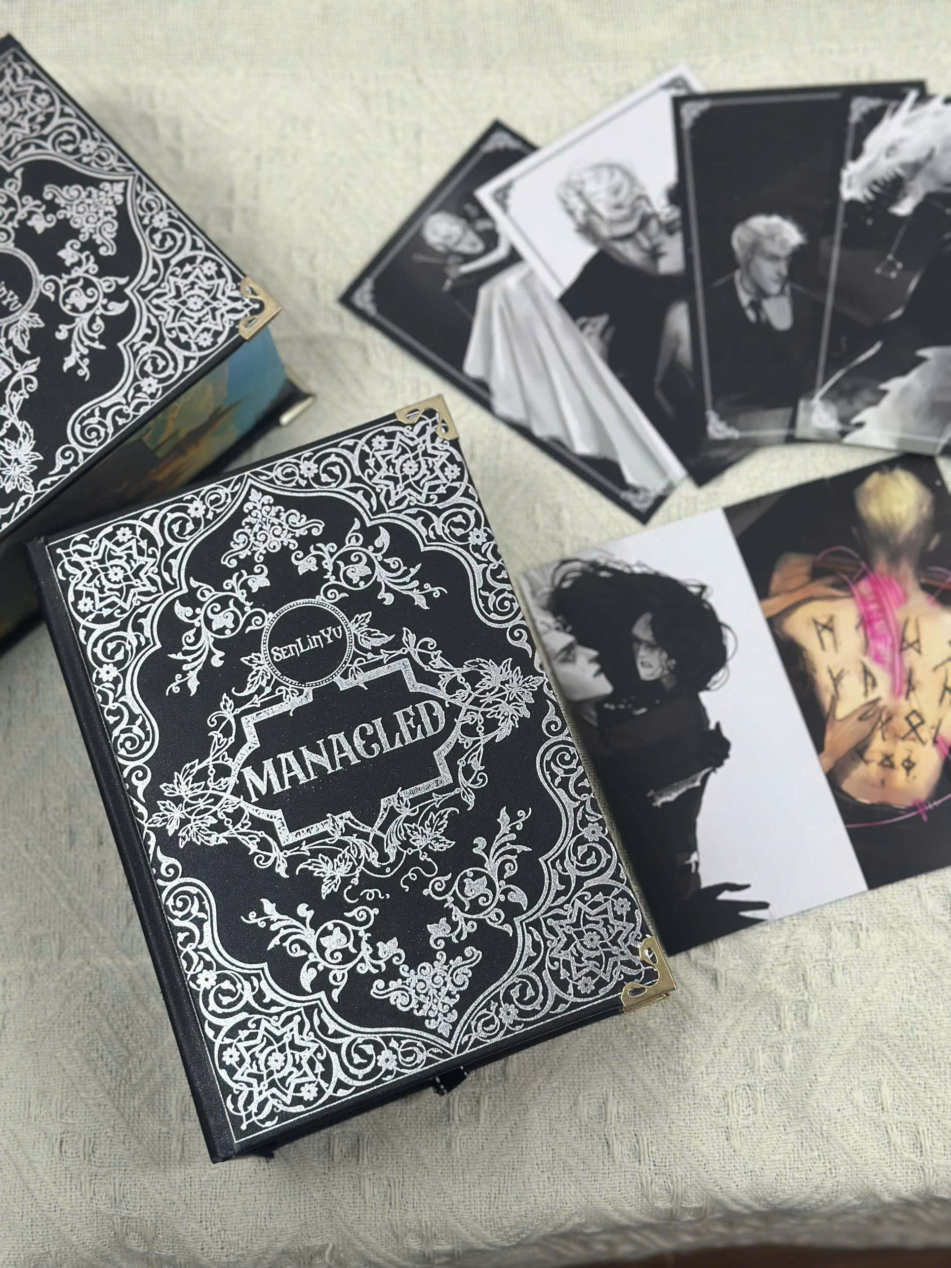 Manacled Collector’s Edition | Silver Foil Hardcover & Hand-Painted Edges