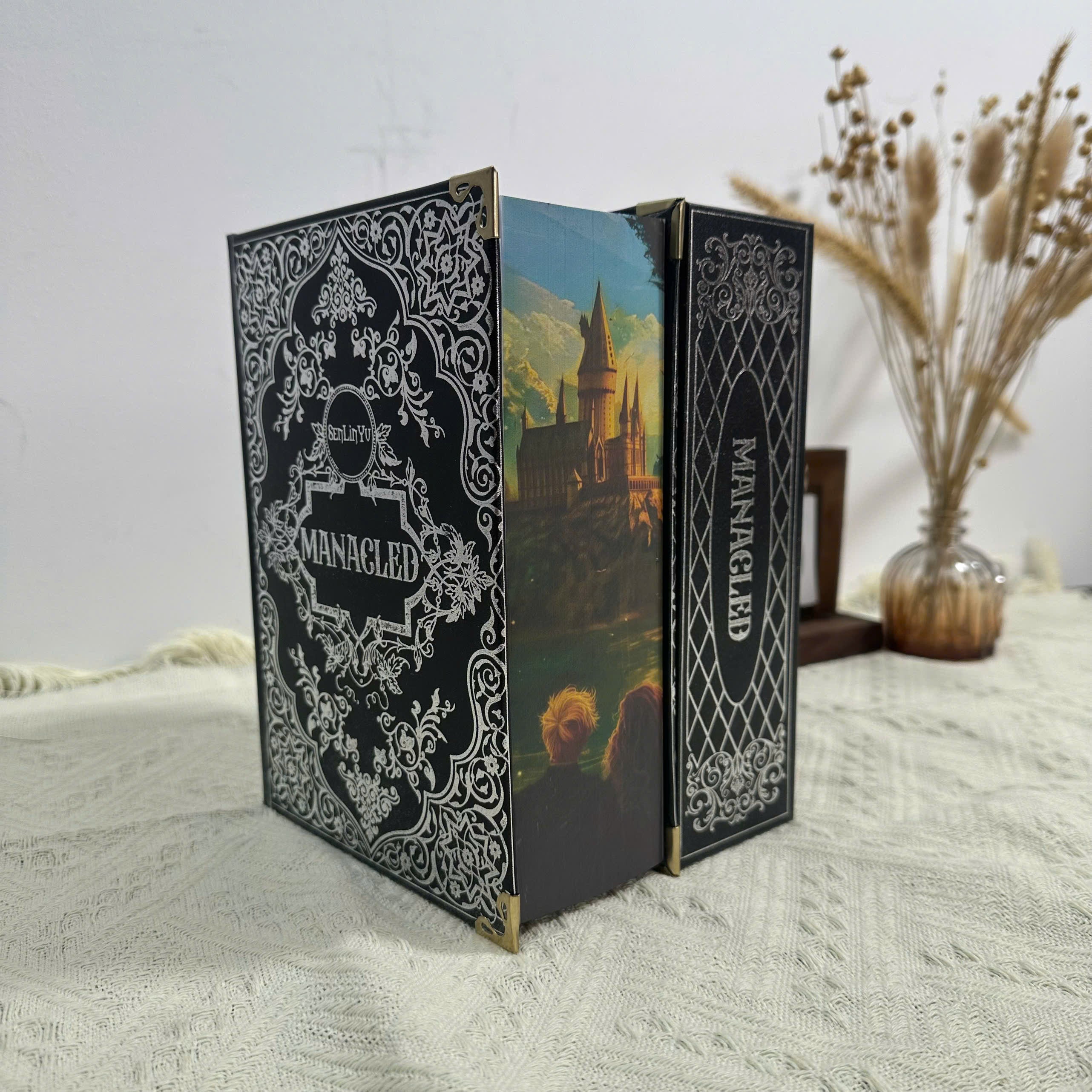 Manacled Collector’s Edition | Silver Foil Hardcover & Hand-Painted Edges